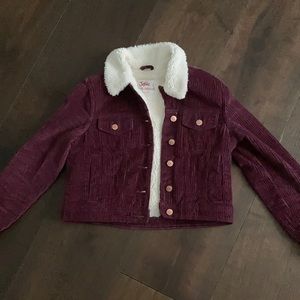 Maroon coat, fuzzy inside and collar